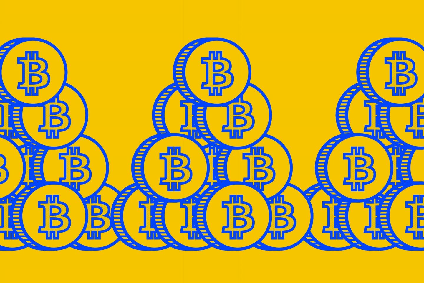 A graphic of coins with the Bitcoin logo stamped on them.
