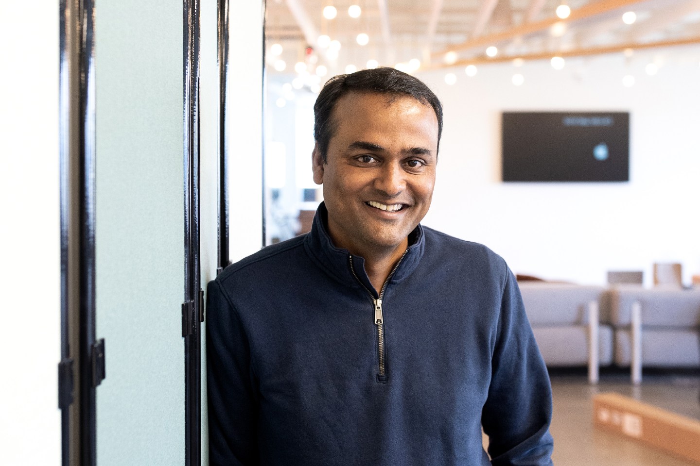 Portrait of DoorDash CFO-Ravi Inukonda inside an office.