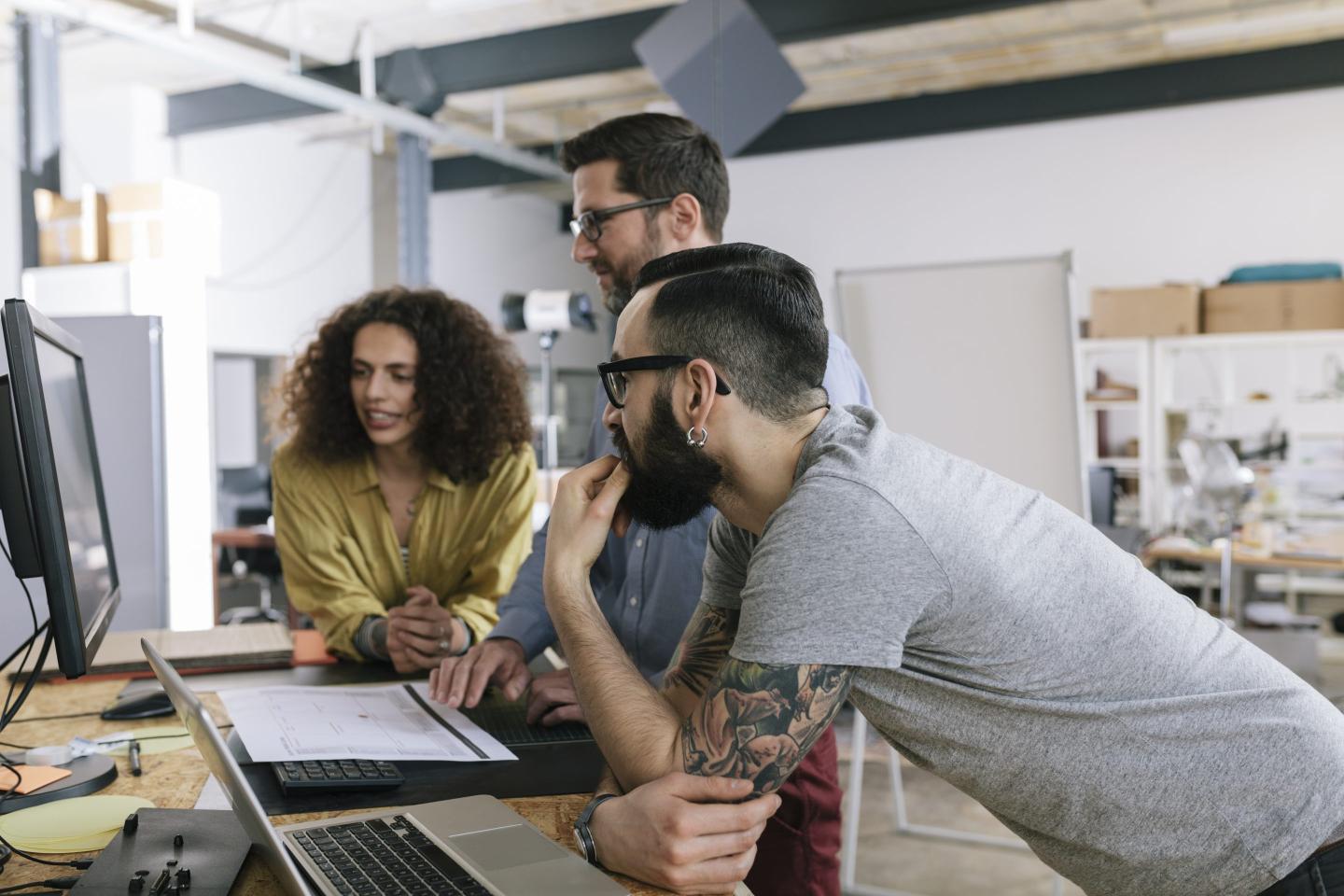 Startup business co-workers working together