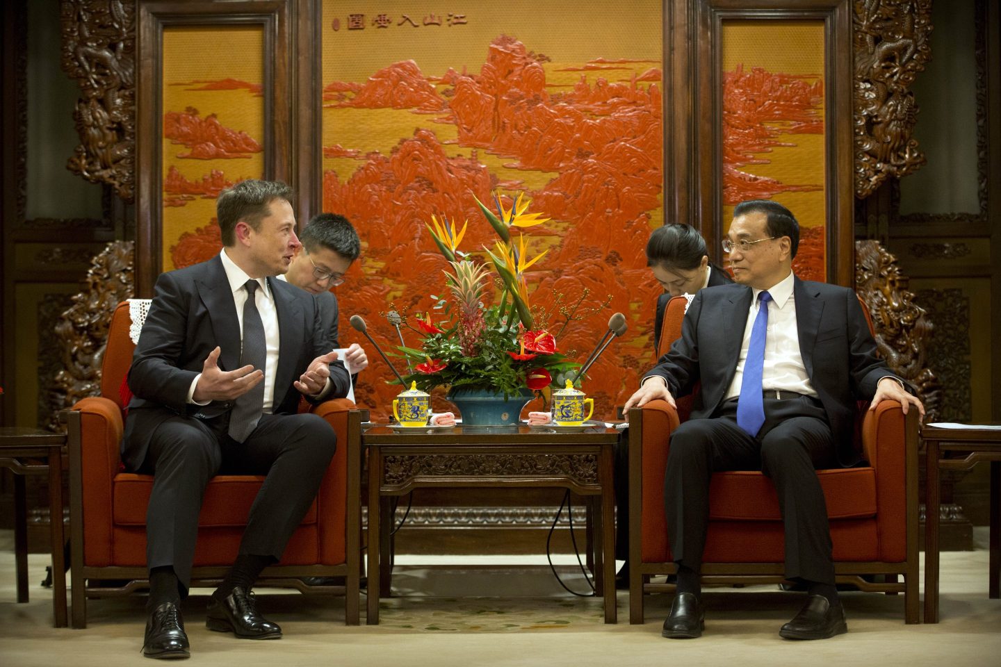 Tesla CEO Elon Musk speaks as Chinese Premier Li Keqiang in Beijing on January 9, 2019.