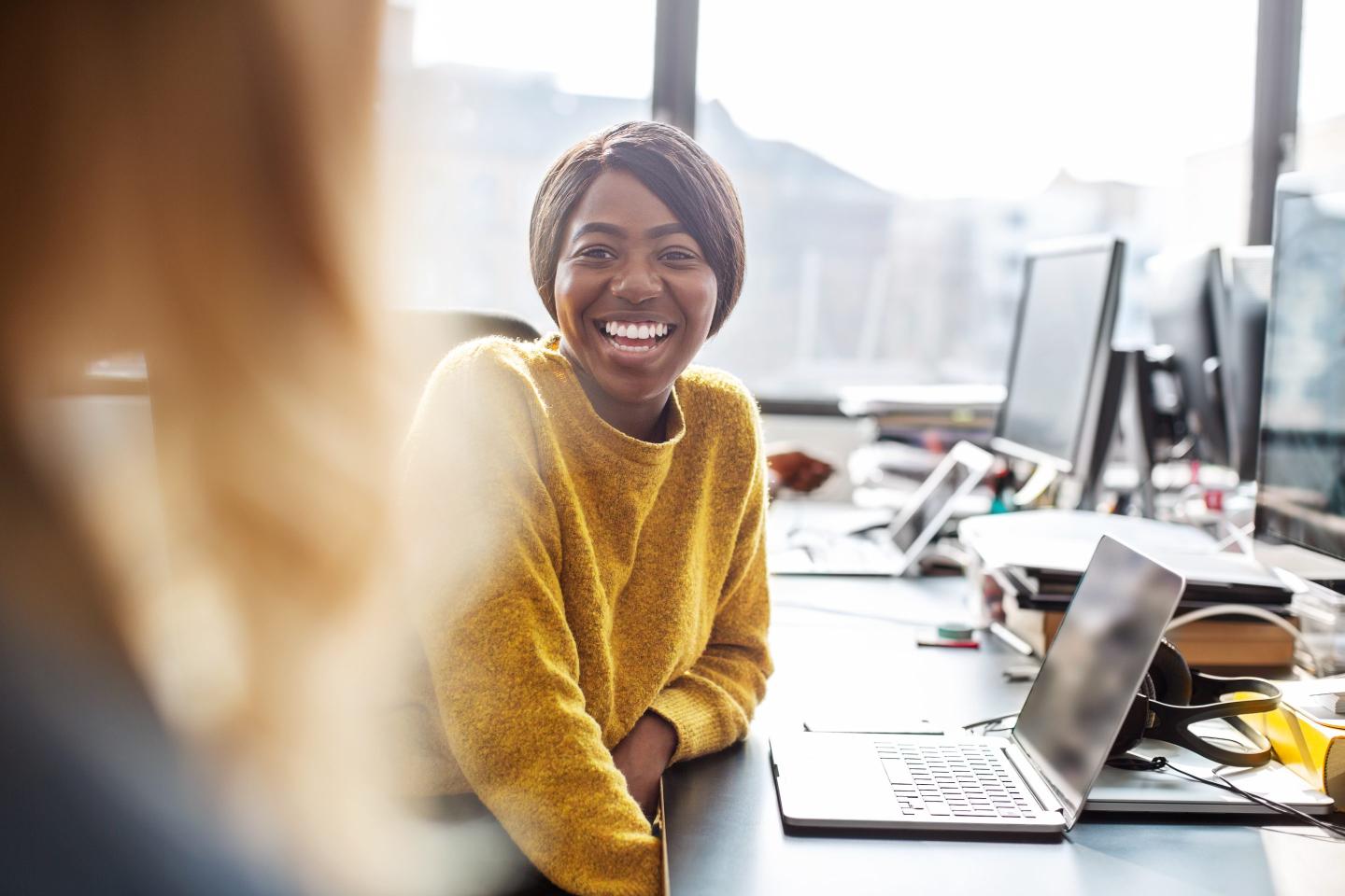 Woman at her desk in the office