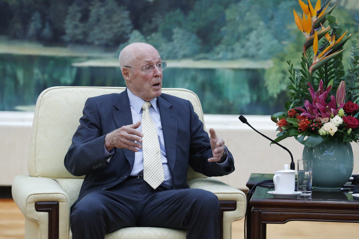 A picture of Hank Paulson talking