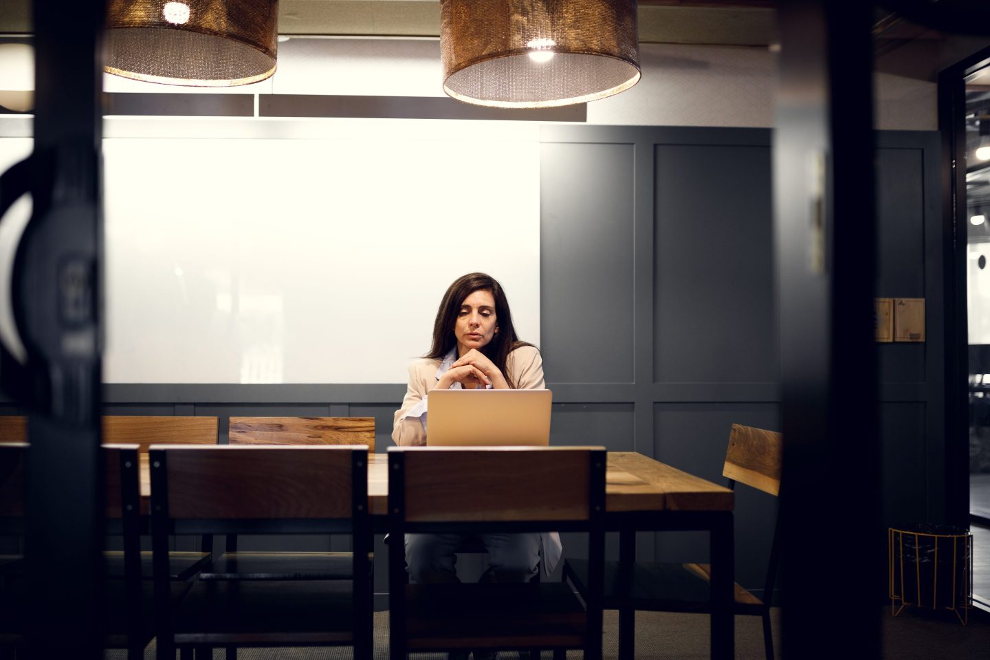 Woman working late at the office.