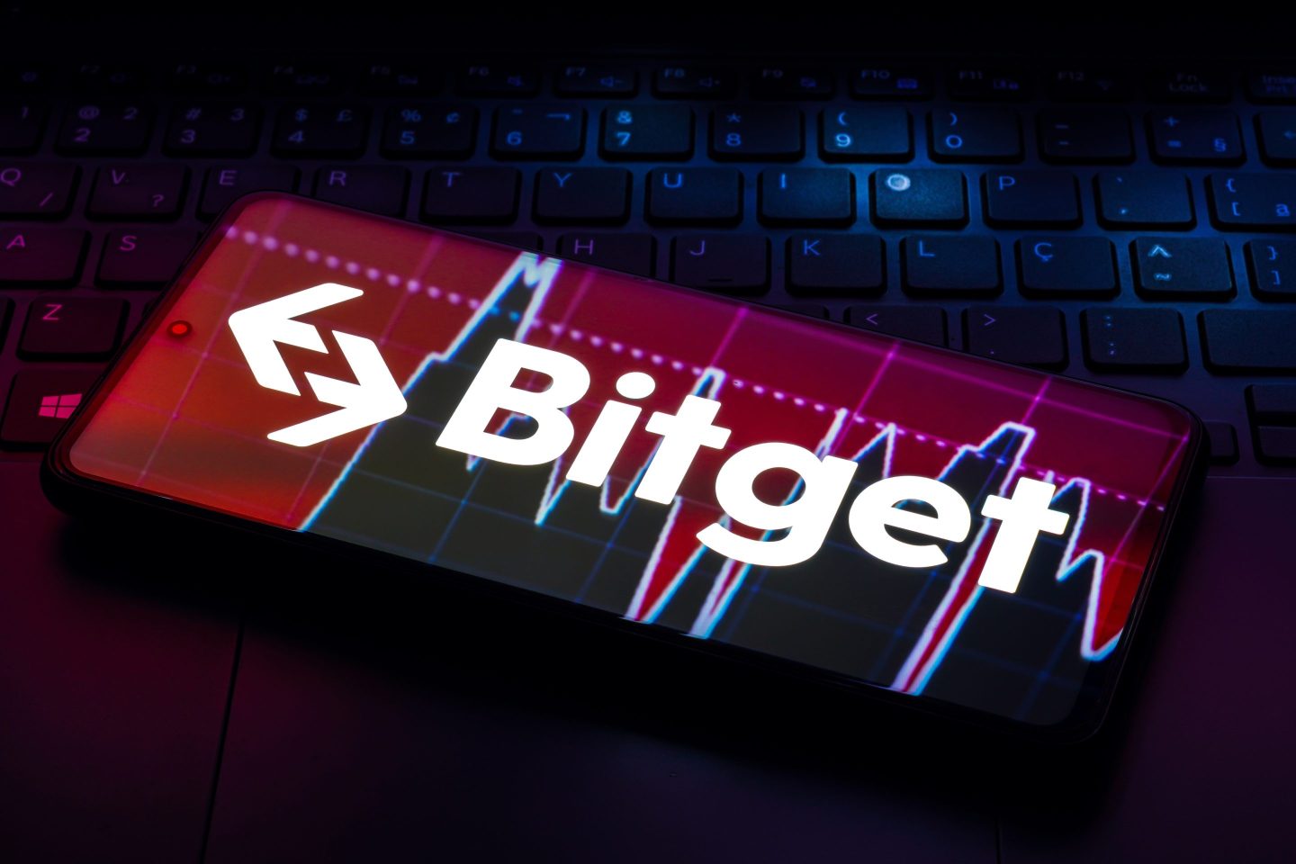 In this photo illustration, the Bitget logo is displayed on a smartphone screen