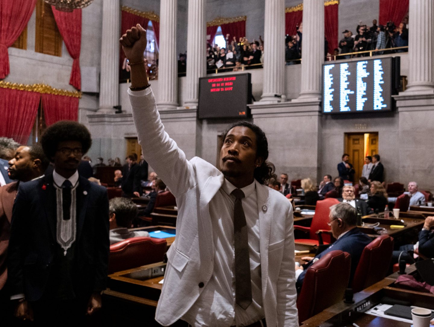  Democratic state Rep. Justin Jones of Nashville gestures during a vote on his expulsion from the state legislature at the State Capitol Building.