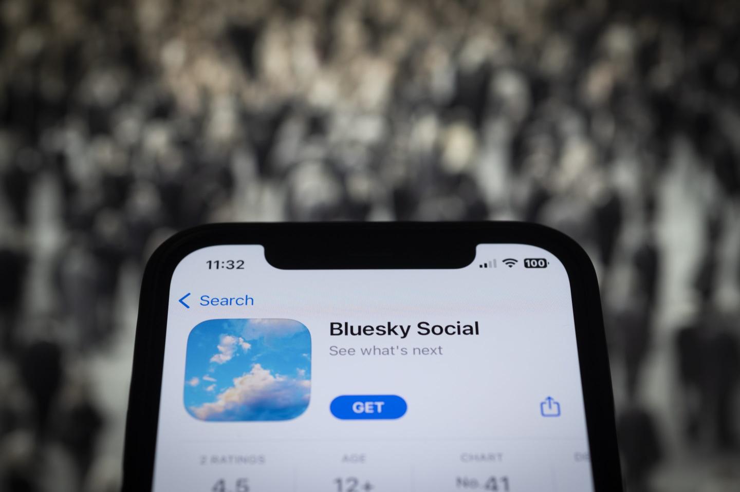 A phone screen showing the Bluesky Social app in the app store