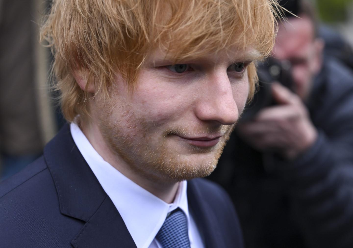 Pop star Ed Sheeran serenades the jury with his guitar during a trial for allegedly stealing a Marvin Gaye classic