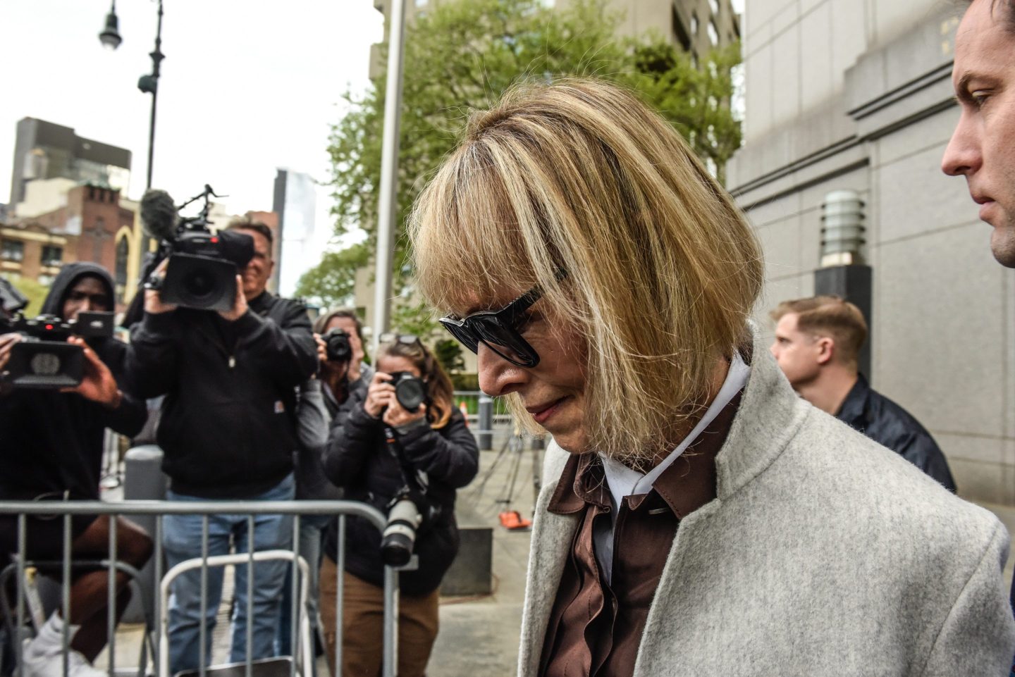 Author E. Jean Carroll leaves federal court in New York.