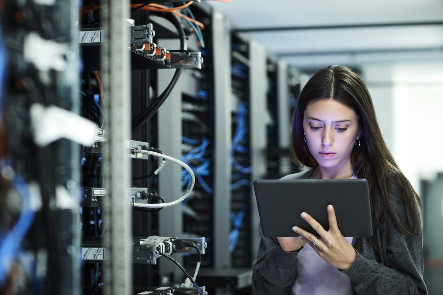 female technician using server