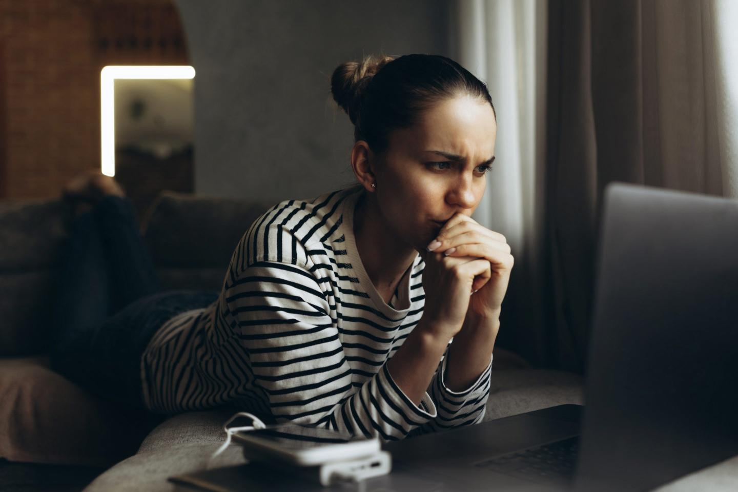 stressed woman at laptop
