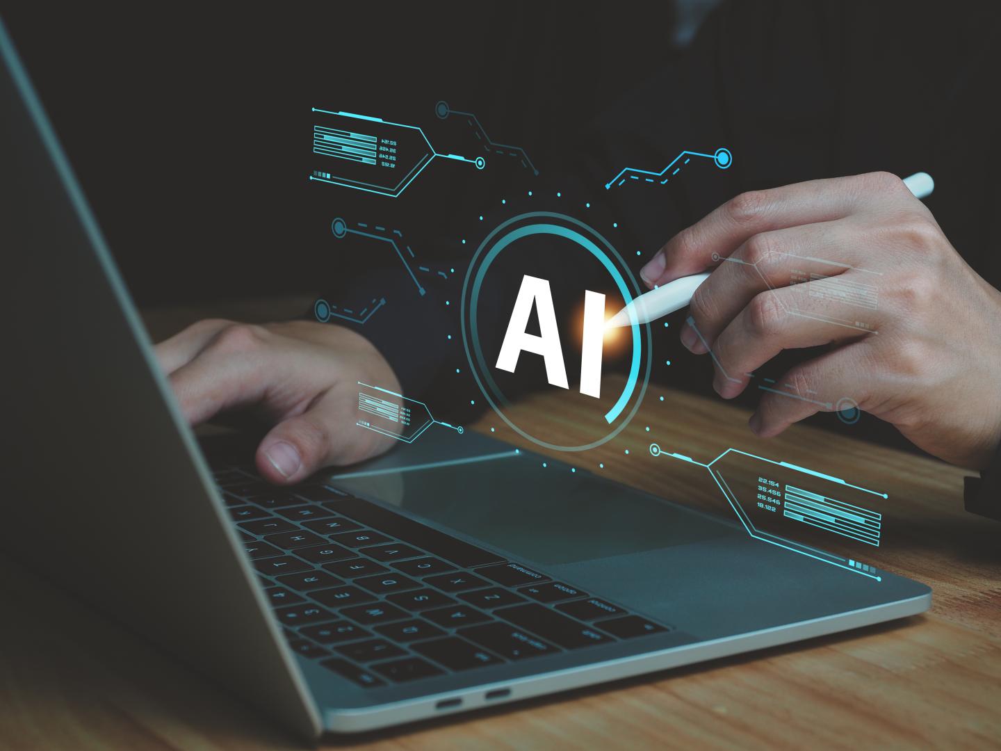Artificial intelligence AI Businessman using laptop computer pen future technology at work