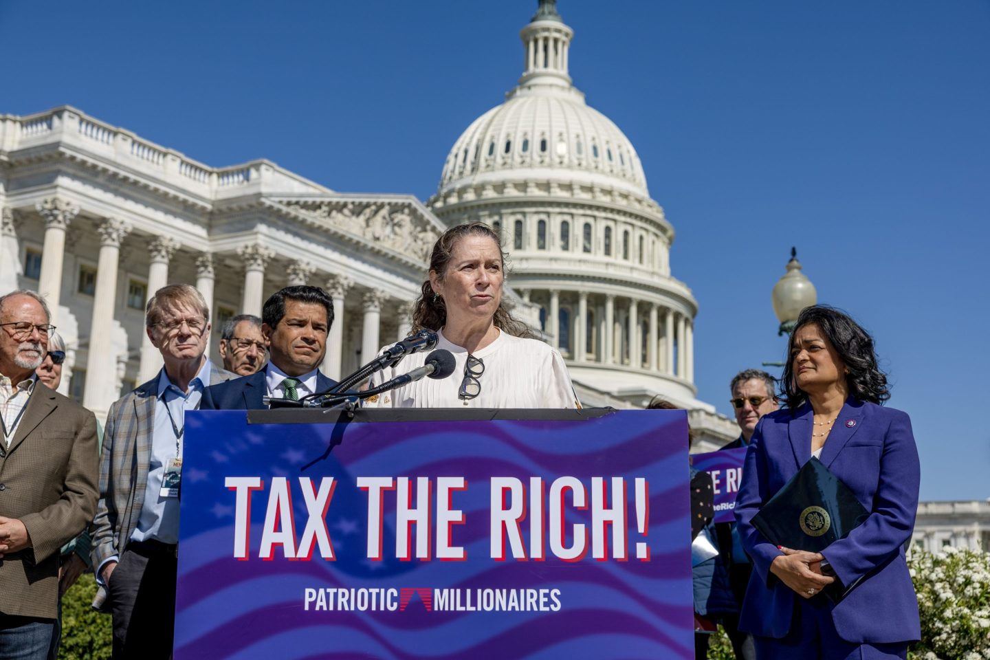 Abigail Disney speaking to a crowd in front of the U.S. Capitol