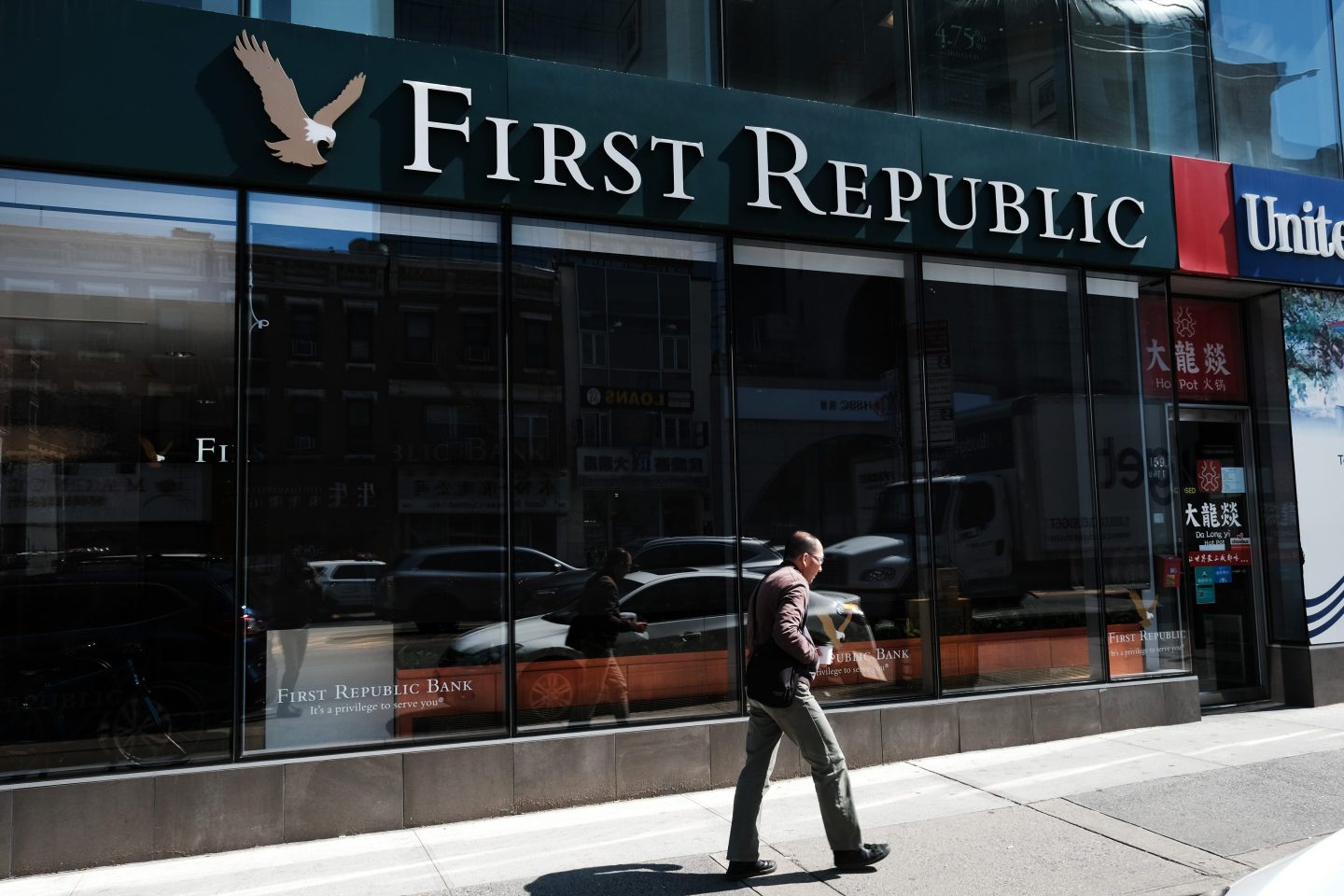 A person walks past a First Republic bank branch in Manhattan on April 24, 2023 in New York City.