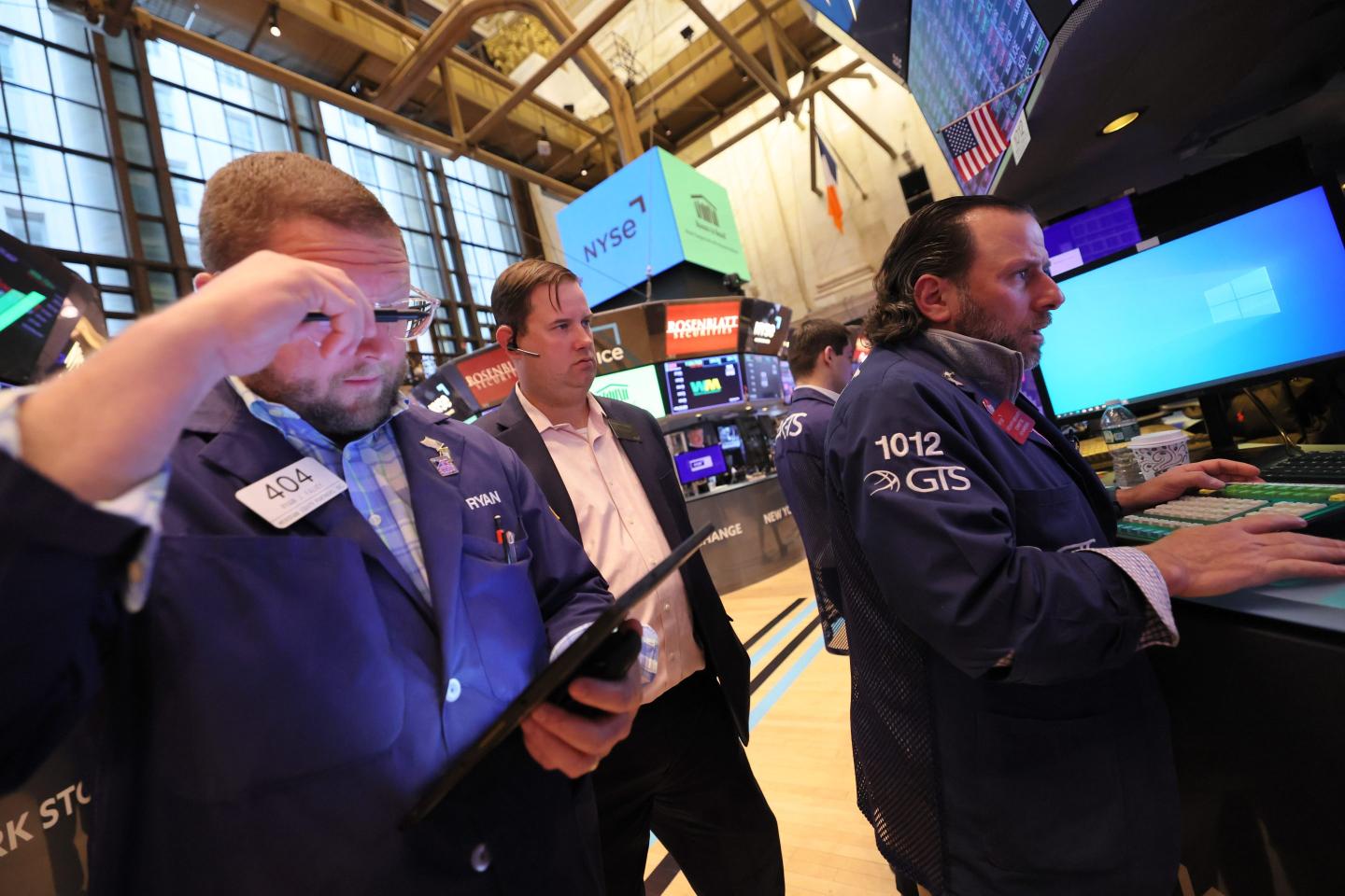 Traders work on the floor of the New York Stock Exchange on April 26, 2023, in New York City.