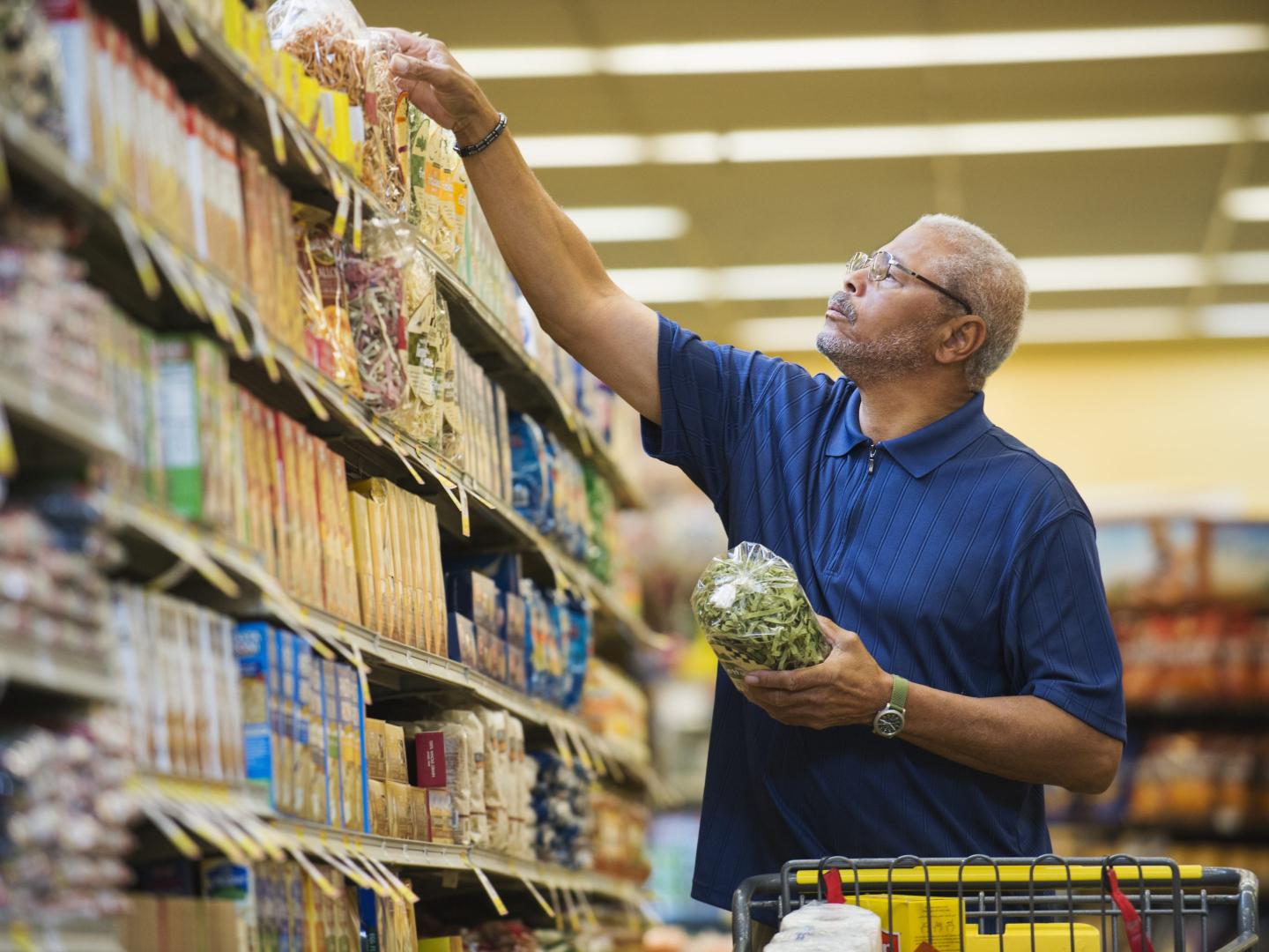 A man shopping in grocery store