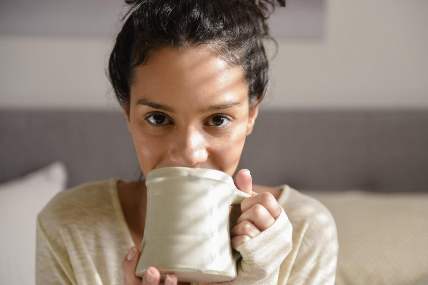 woman drinking coffee