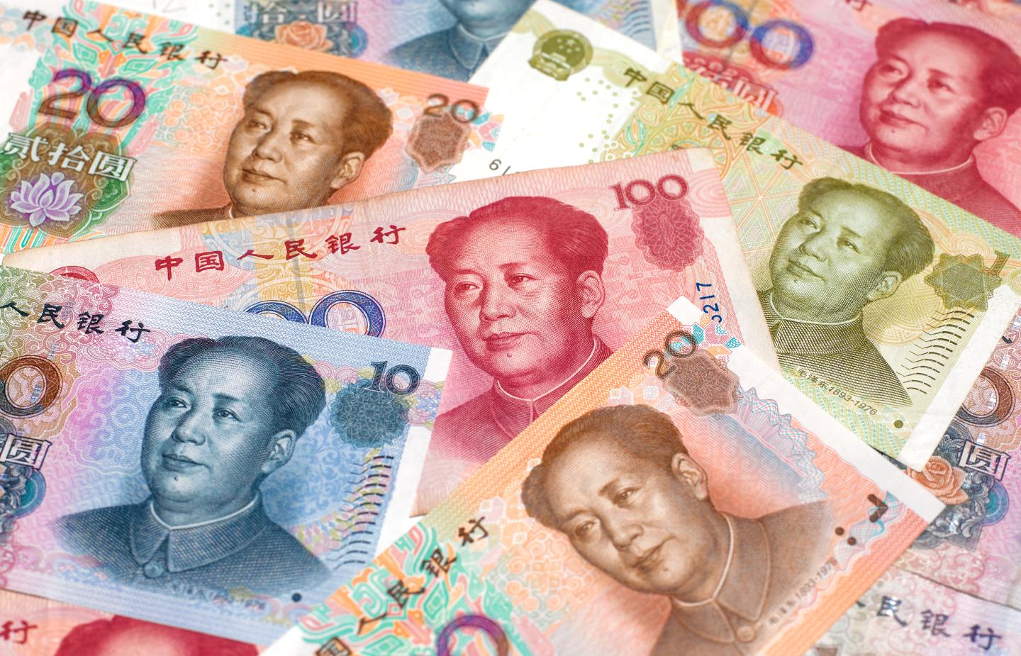 Close up of Chinese Yuan notes, with Mao Tse-tung.