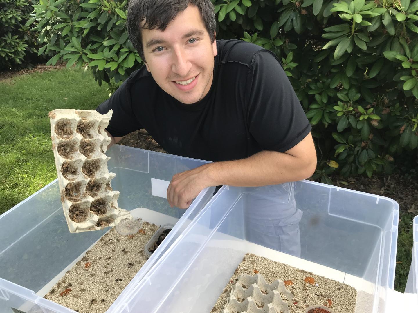 Jeff Neal holding crickets. 