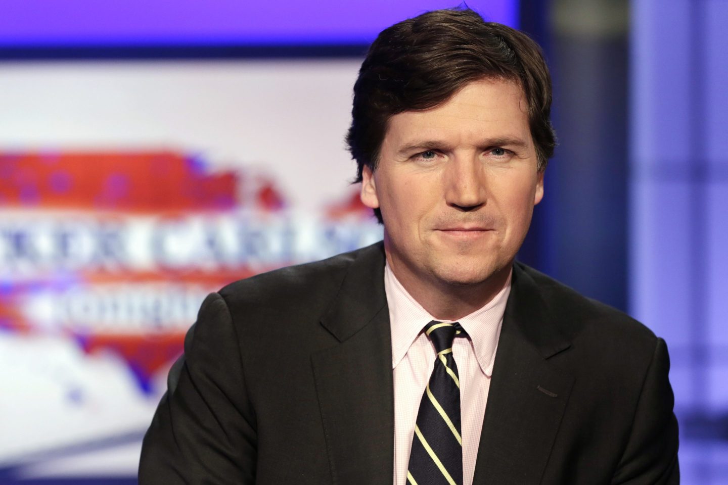 Tucker Carlson, host of "Tucker Carlson Tonight," poses for photos in a Fox News Channel studio on March 2, 2017, in New York.