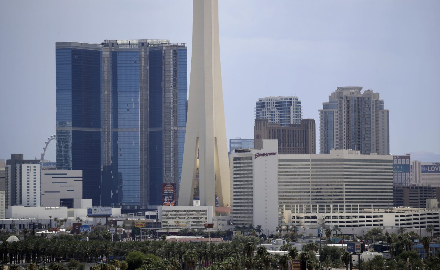 The partially completed Fontainebleau Las Vegas, the blue building on the left, stands along the skyline, Aug. 29, 2017, in Las Vegas.