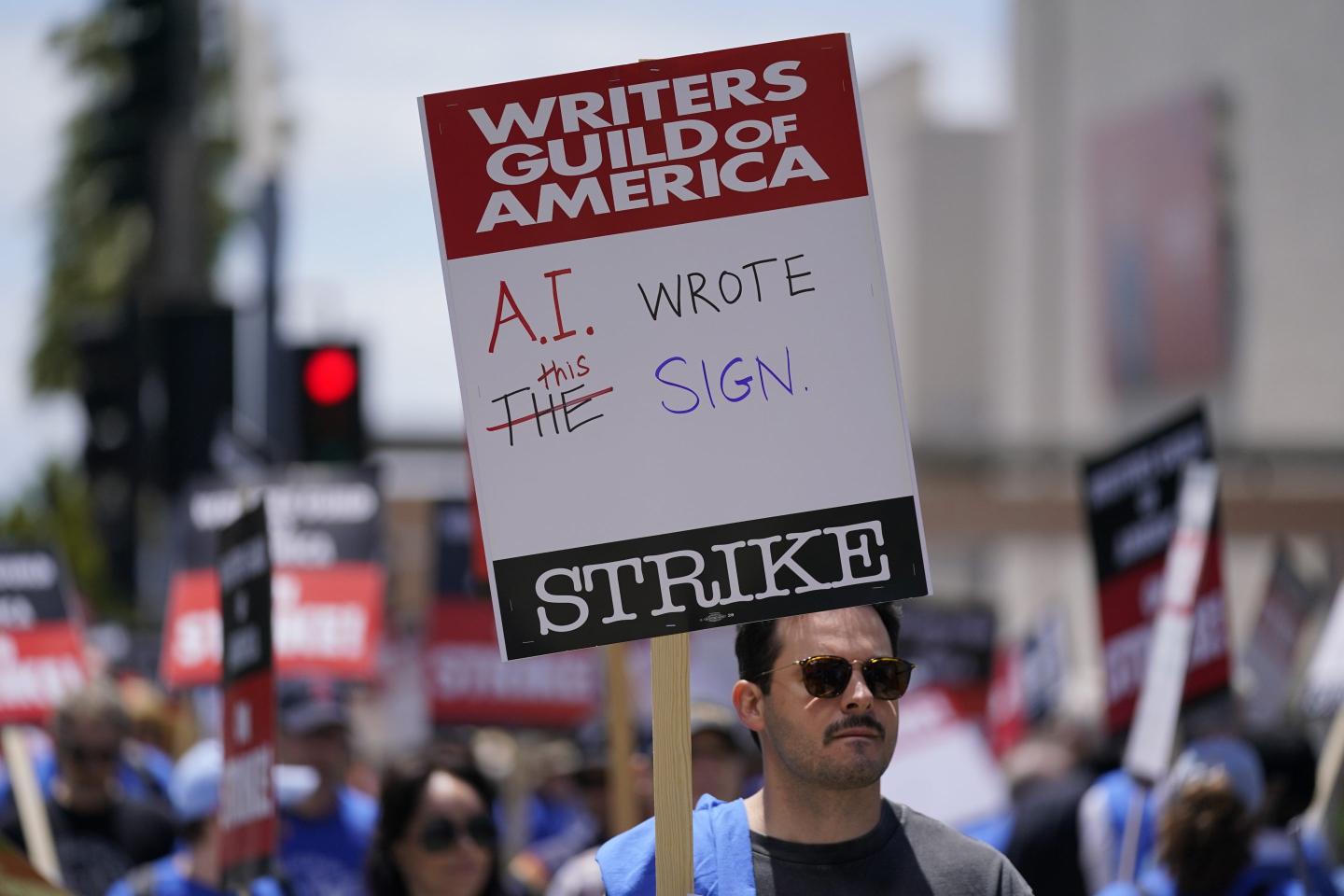 Members of the The Writers Guild of America picket outside Fox Studios on May 2, 2023, in Los Angeles.