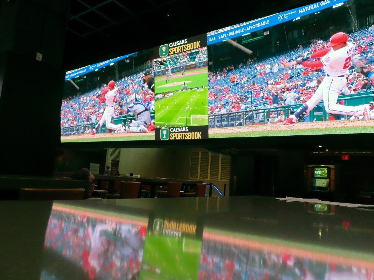 A screen at the sports book in the Tropicana casino in Atlantic City N.J. shows Juan Soto, then of the Washington Nationals, hitting a home run on May 12, 2022.