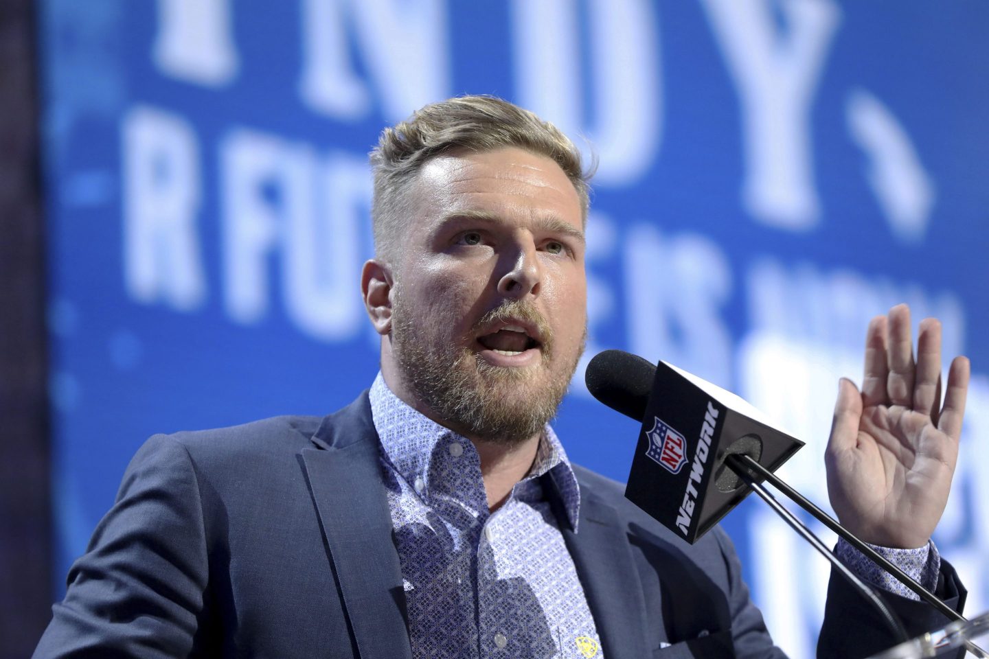 Former Indianapolis Colts player Pat McAfee announces the Colts' third round pick at the NFL football draft, April 26, 2019, in Nashville, Tenn.