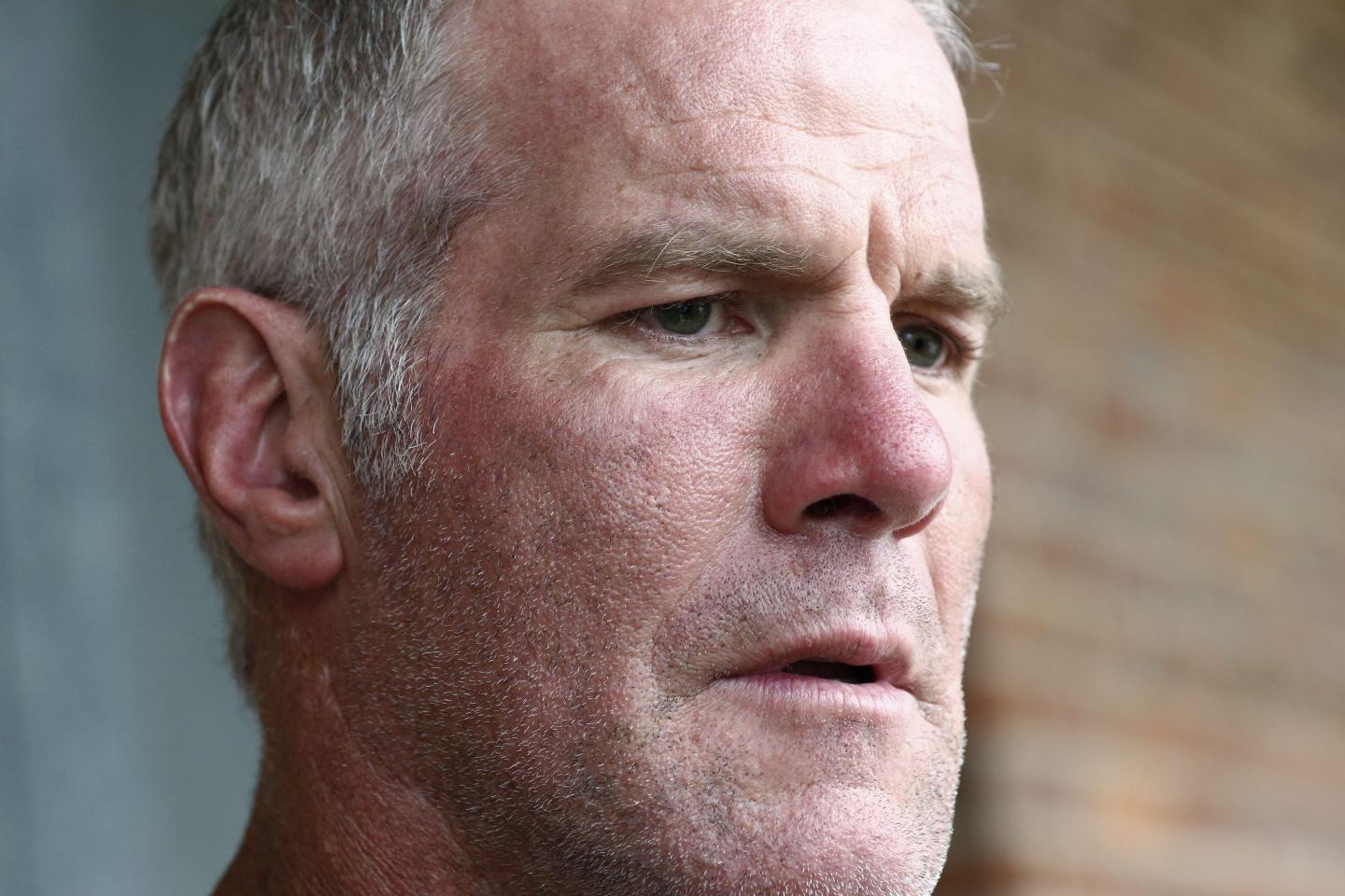 Former NFL quarterback Brett Favre would like to be removed as a defendant in a civil trial over millions of misspent welfare money
