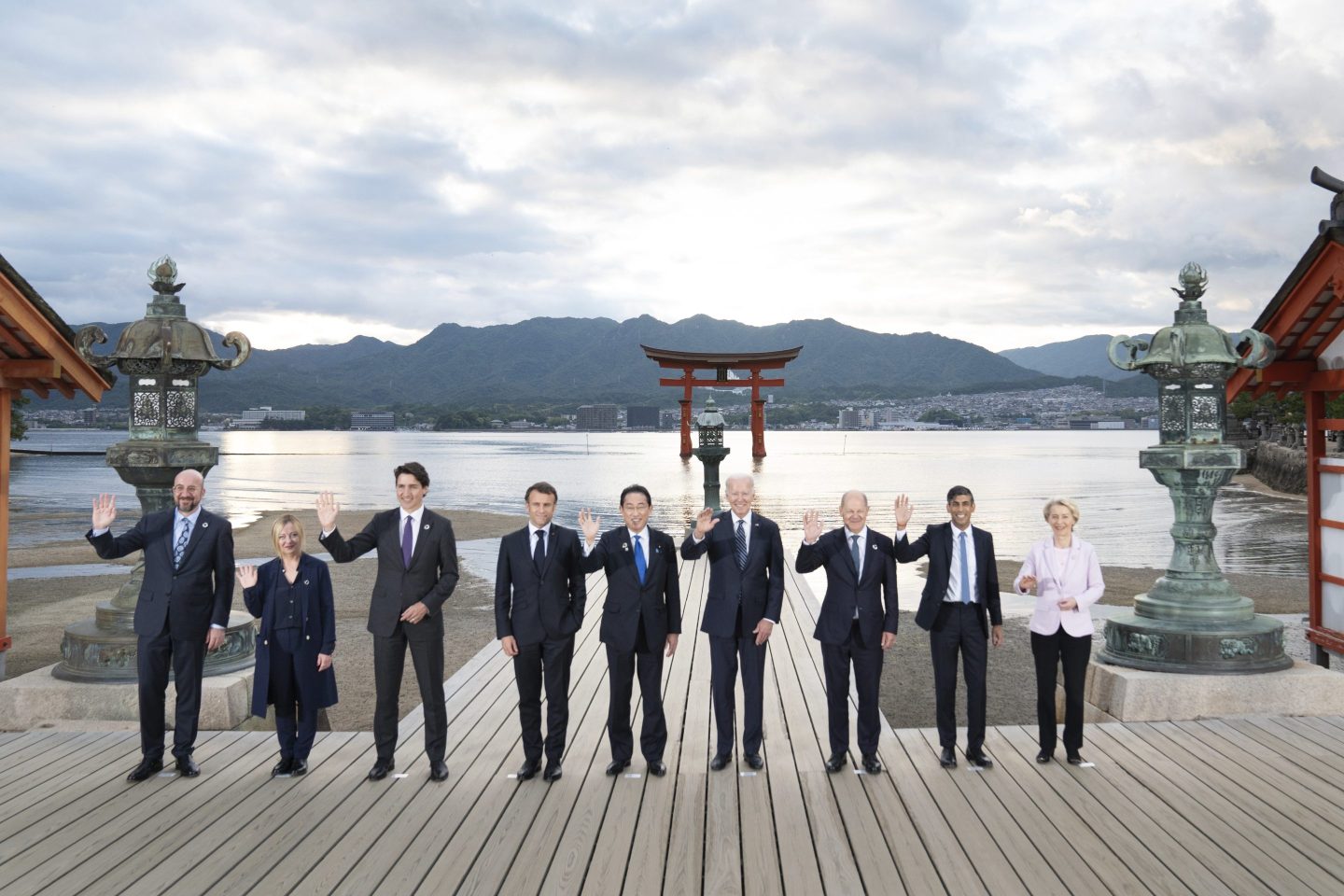 From left, European Council President Charles Michel, Italian Premier Giorgia Meloni, Canada's Prime Minister Justin Trudeau, French President Emmanuel Macron, Japanese Prime Minister Fumio Kishida, US President Joe Biden, German Chancellor Olaf Scholz, British Prime Minister Rishi Sunak and European Commission President Ursula von der Leyen pose for the family photo at the Itsukushima Shrine in Hiroshima, western Japan, Friday, May 19, 2023.