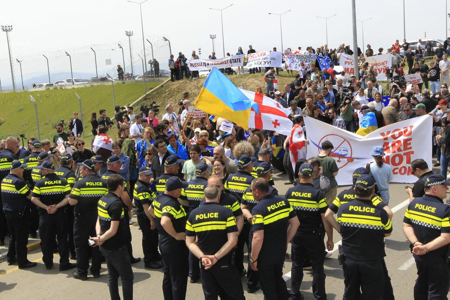 Russian flights to Georgia are starting again despite opposition from protesters and the country’s own president