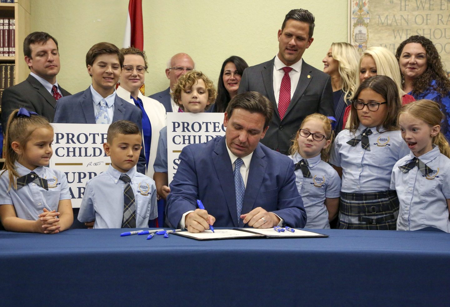 Florida Gov. Ron DeSantis signs the Parental Rights in Education bill, also known as the "Don't say gay" bill, at Classical Preparatory School, on March 28, 2022, in Shady Hills, Fla.