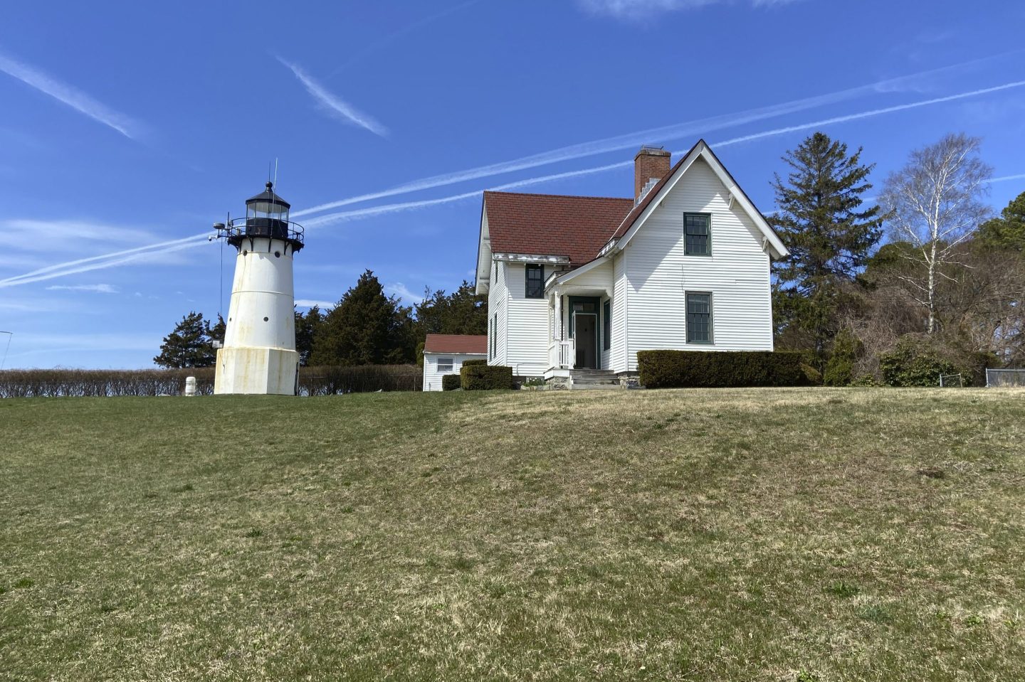 Warwick Neck Light, that dates to 1827 and was a onetime important navigation tool for mariners making their way to Providence, R.I., stands near Narragansett Bay, April 12, 2023, in Warwick, R.I.