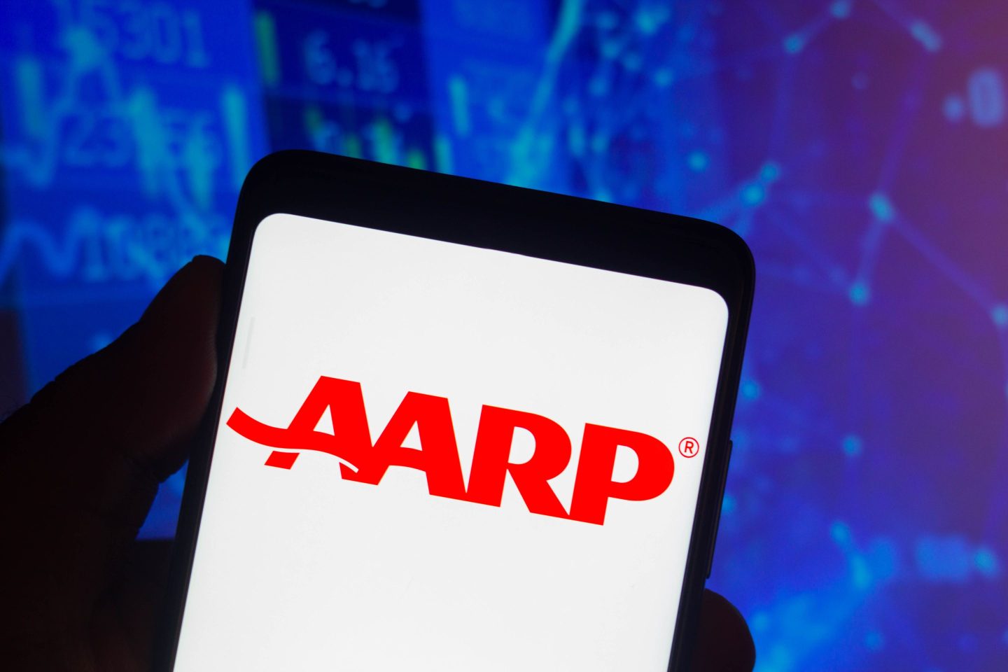 he American Association of Retired Persons (AARP) logo seen displayed on a smartphone screen