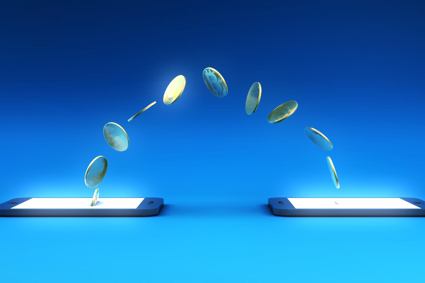 Digital Wallet with Smartphones Sending Receiving Bitcoins.