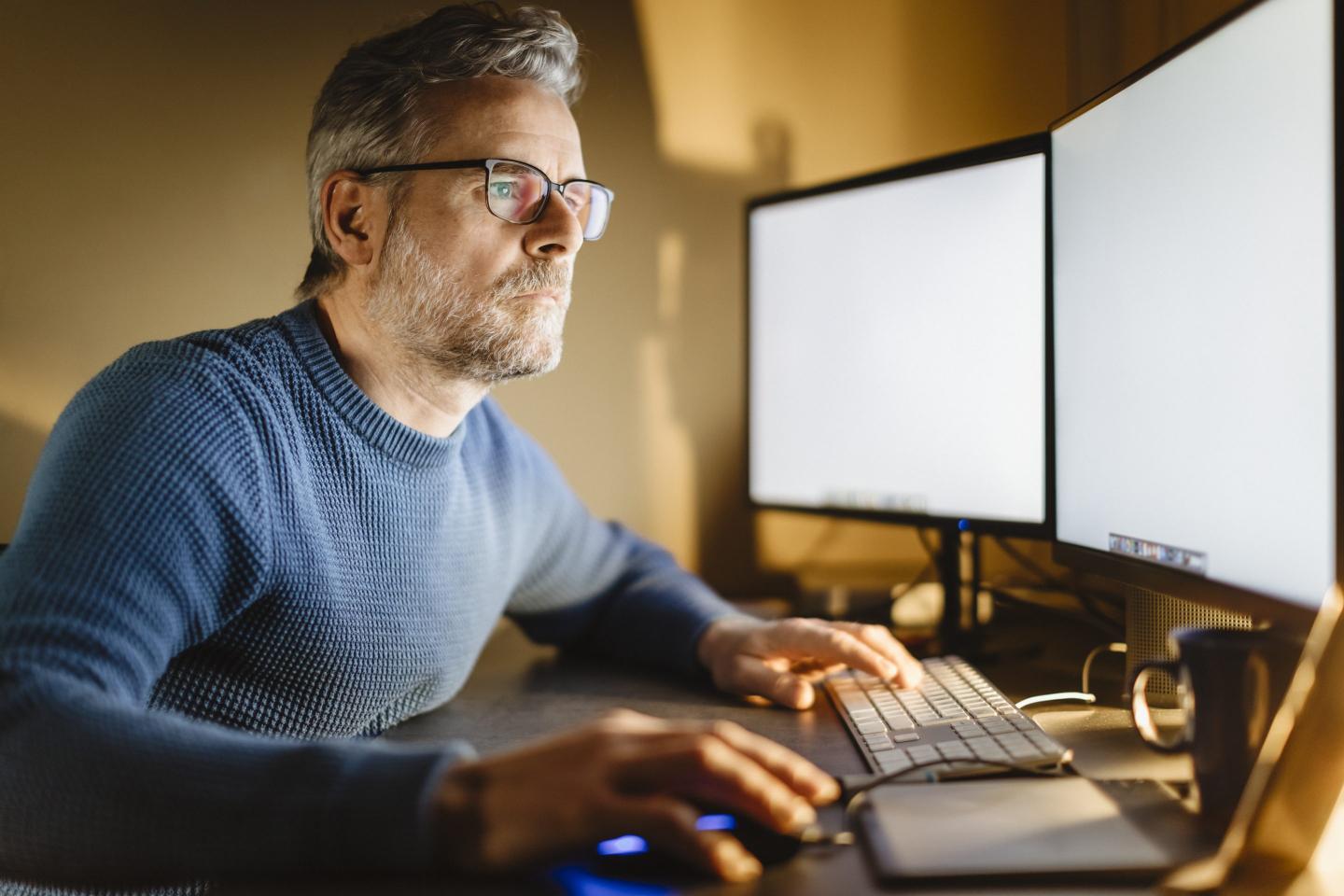 Man staring at laptop