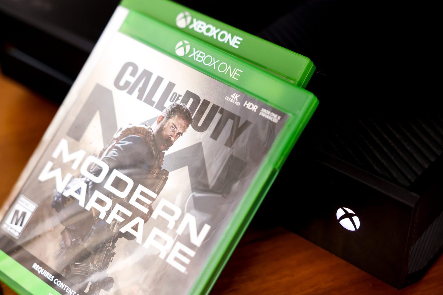 Microsoft's Xbox One video game console and Activision Blizzard's Call of Duty: Modern Warfare video game arranged in Denver, Colorado, U.S., on Tuesday, Jan. 18, 2022.