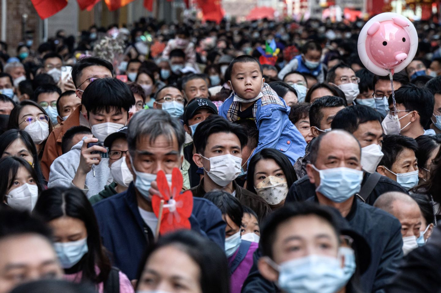 A spring festival flower market in Guangzhou reopens on Jan. 20 after closures to prevent the spread of COVID. Cases of Omicron variant XBB are mounting in China, forming a new wave expected to crest around 65 million cases weekly by the end of June.