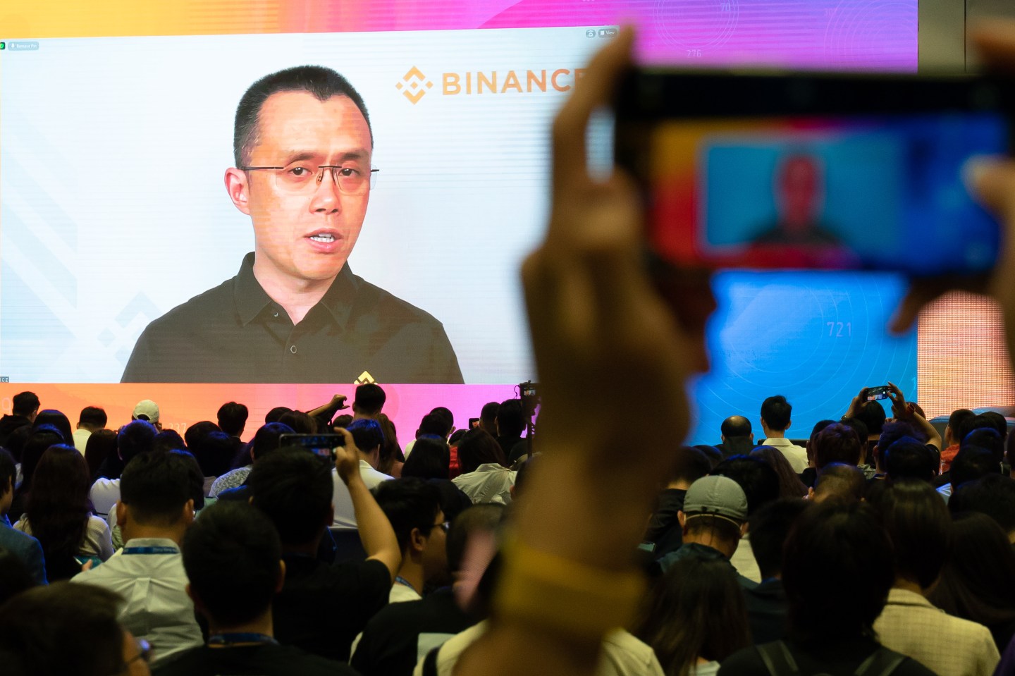 Changpeng Zhao, founder and CEO of Binance, speaks virtually during an April conference in Hong Kong.