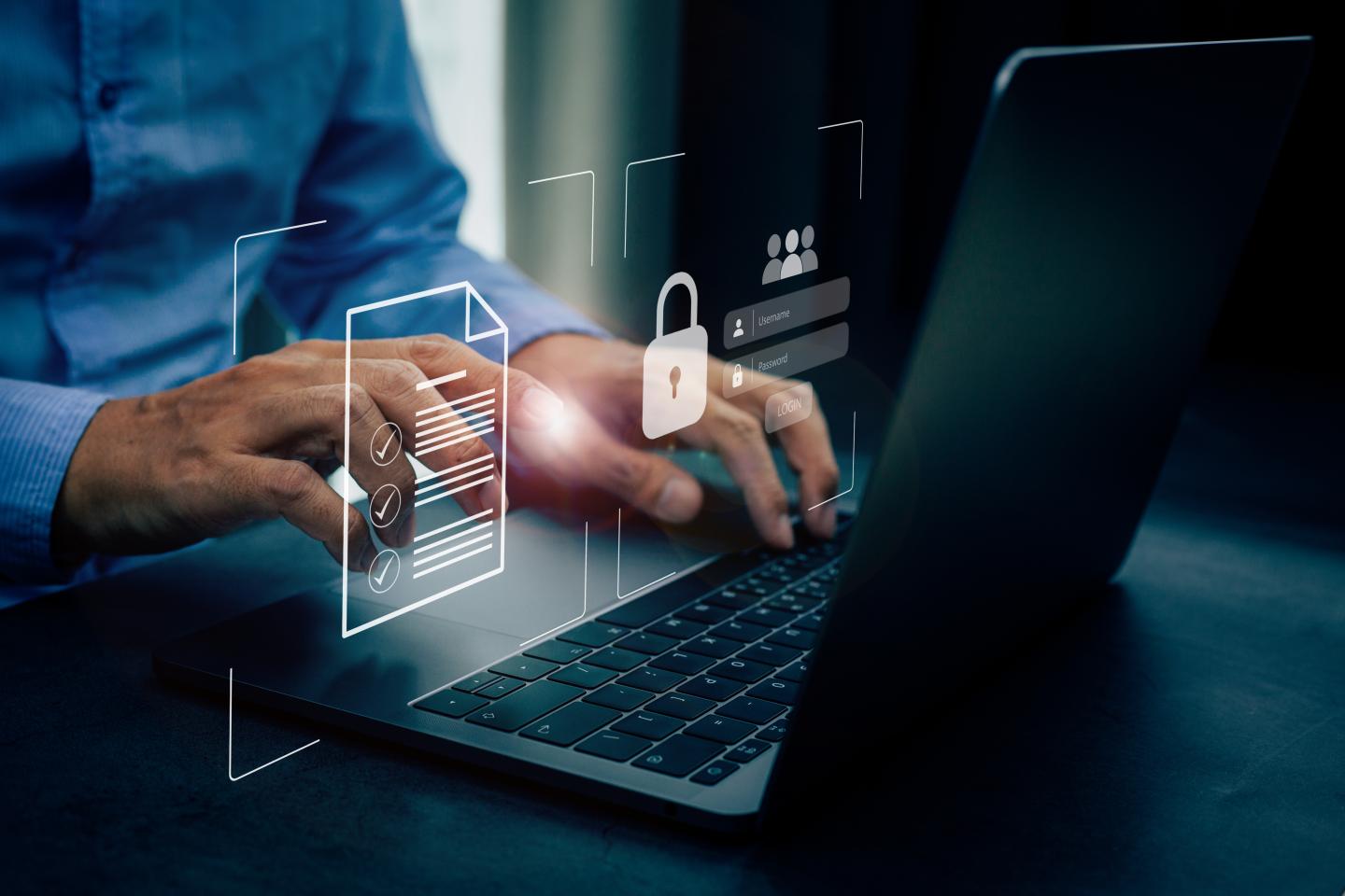 Businessmen protecting personal data on laptop and virtual interfaces,