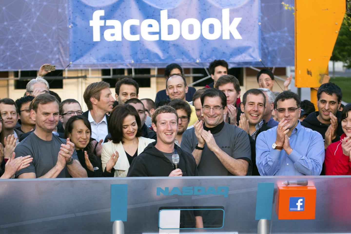Mark Zuckerberg, chief executive officer of Facebook Inc. (now Meta), speaks during the remote opening bell ringing cerermony for the opening of trading at the Nasdaq MarketSite on Friday, May 18, 2012. Facebook Inc. started trading that day, following its initial public offering.
