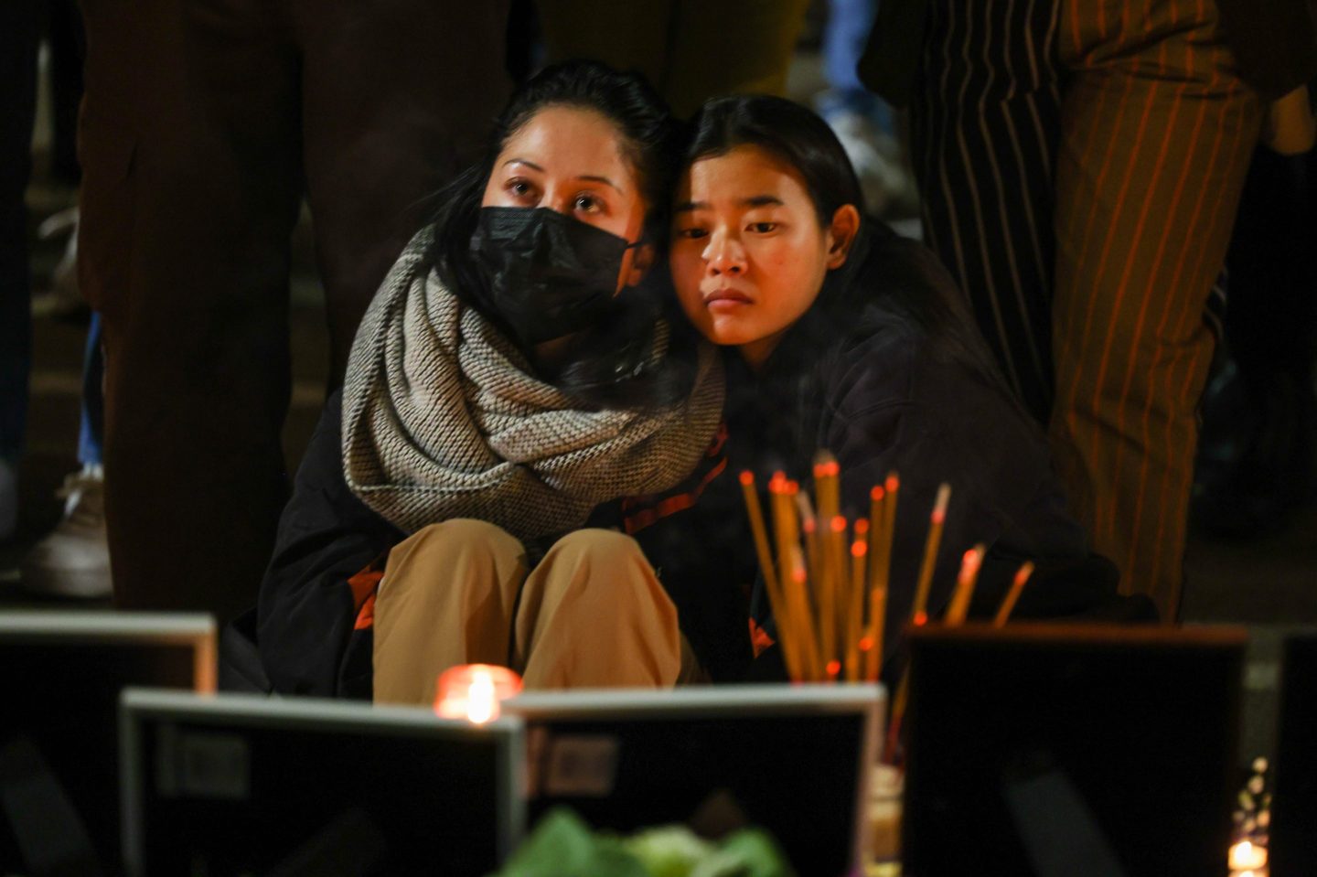 A candlelight vigil is held on Jan. 25, following a mass shooting in Monterey Park.