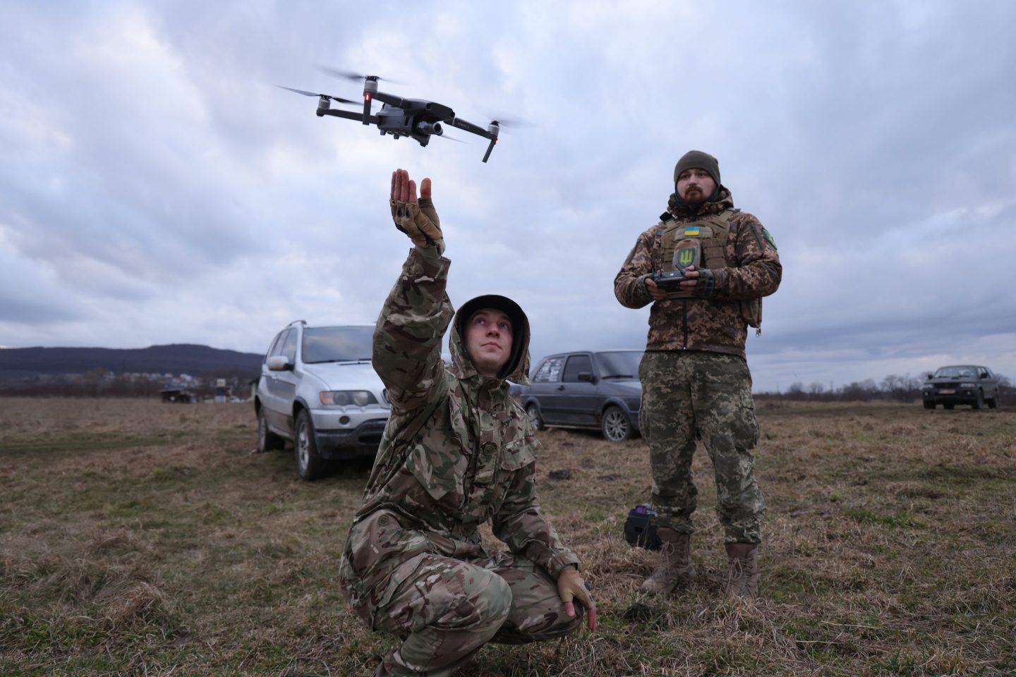 Participant practice flying a drone, in this case to locate colleagues who were hiding and pretending to be enemy snipers, during a combat training day hosted by a local paramilitary civil formation called TSEL on February 22, 2023 in Lviv region, Ukraine.