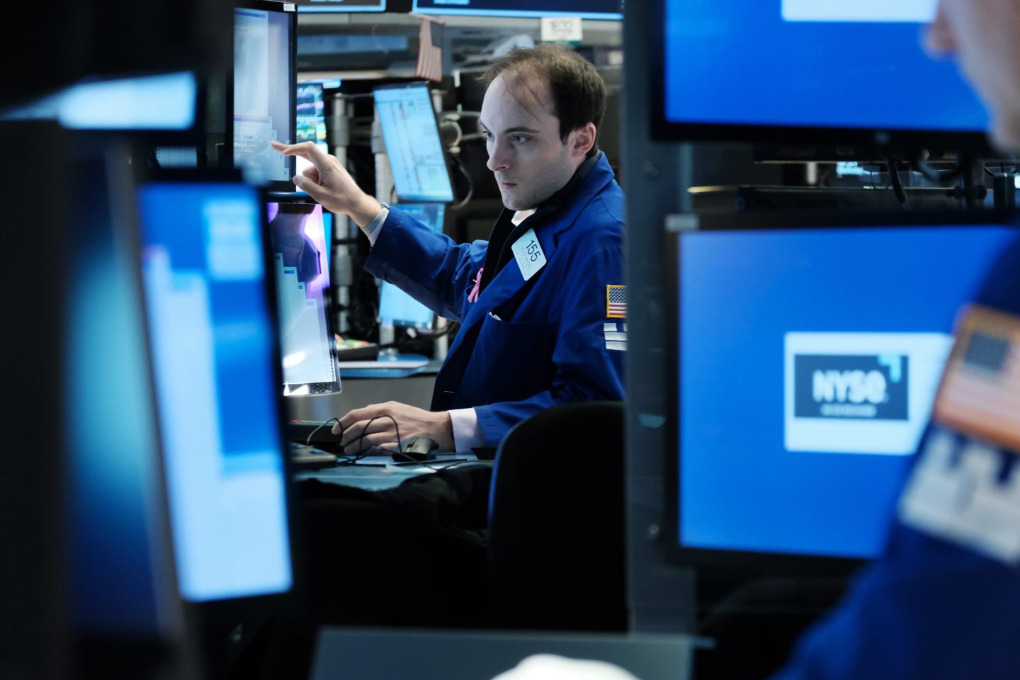 Traders at the New York Stock Exchange (NYSE) on May 3, 2023.