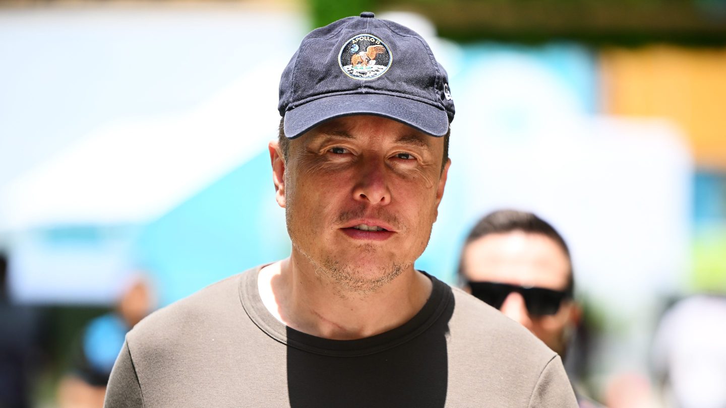 Elon Musk walks in the Paddock prior to final practice ahead of the F1 Grand Prix of Miami at Miami International Autodrome on May 06, 2023 in Miami, Florida.