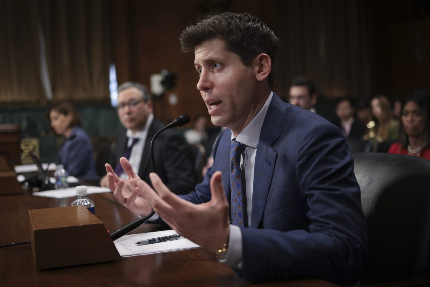 OpenAI CEO Sam Altman testifying before a Senate Judiciary Commitee subcomittee.