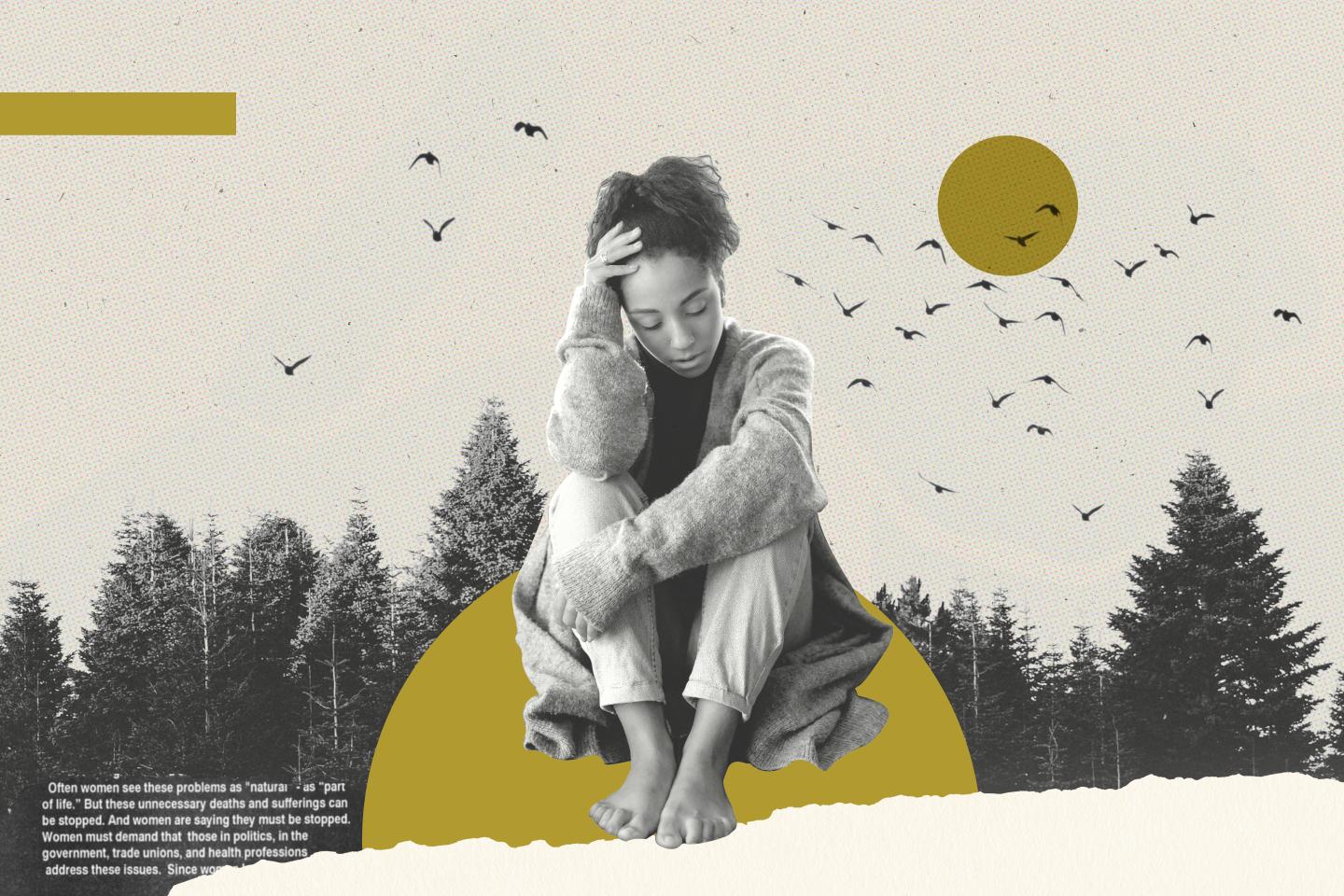 Women sitting with her head in her hand looking sad.