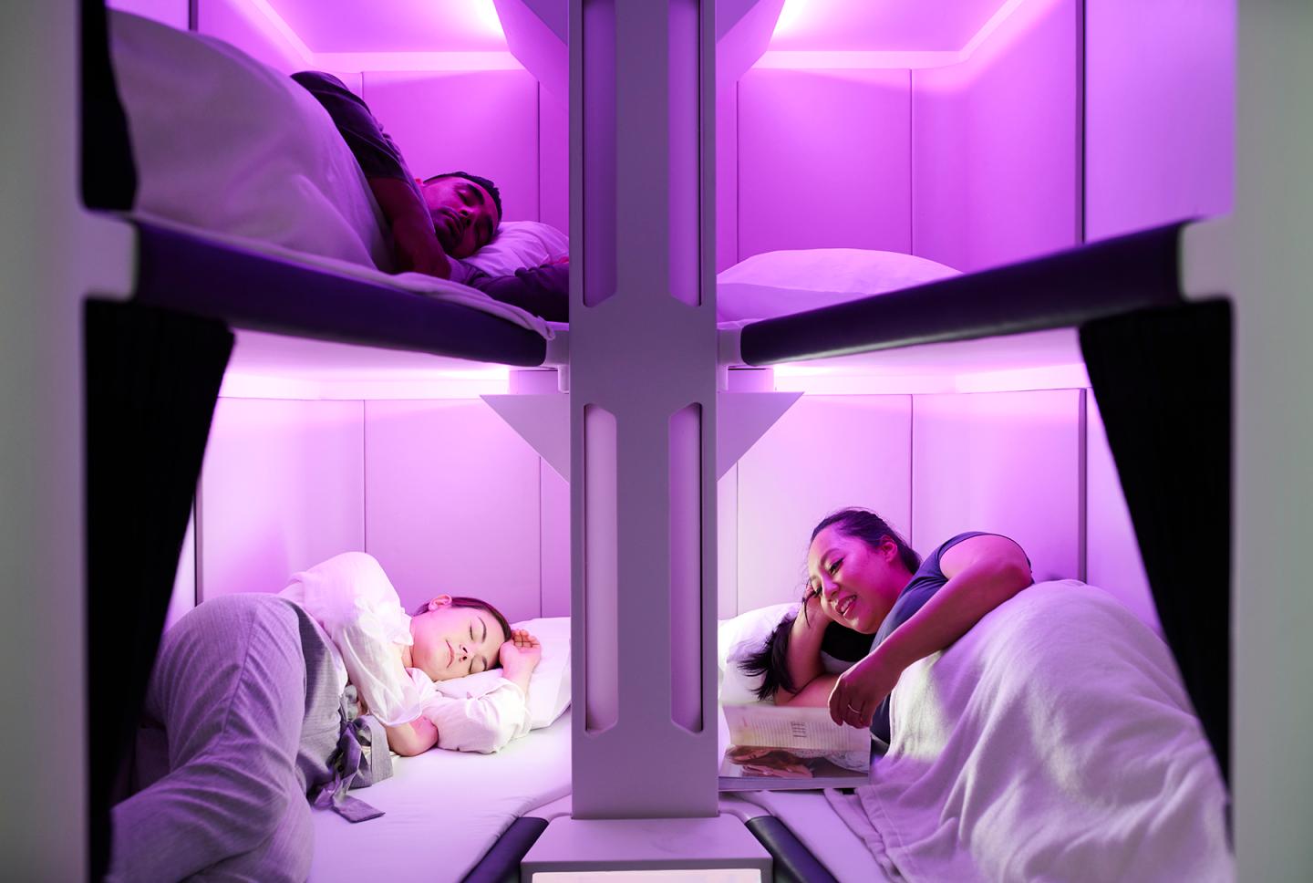 People sleeping in Air New Zealand's planned Skynest bunk beds.
