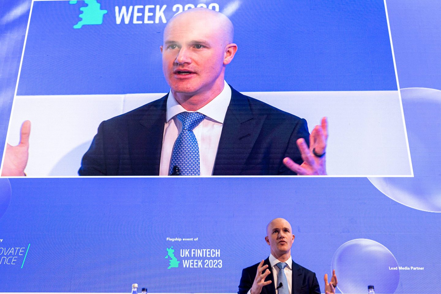Coinbase CEO Brian Armstrong is seen speaking at Innovate Finance's Global Summit on April 18, 2023, in London.