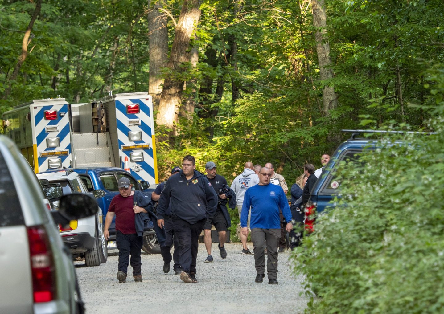Authorities secure the entrance to Mine Bank Trail, an access point to the rescue operation along the Blue Ridge Parkway where a Cessna Citation crashed over mountainous terrain near Montebello, Va., Sunday, June 4, 2023.