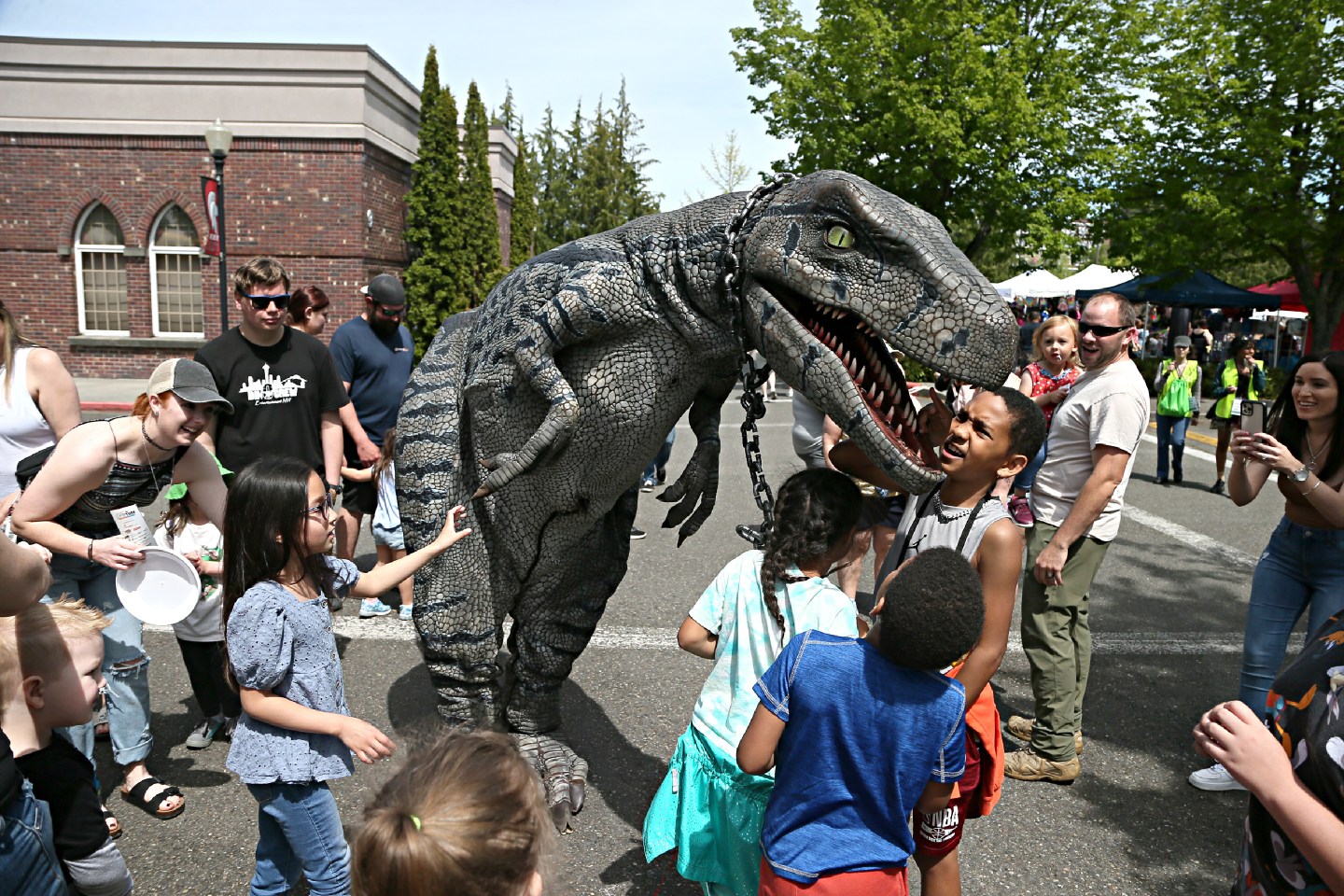 Prehistoric fun at the Lacey Spring Fair, hosted by St. Martin’s University, in Lacey, Wash.